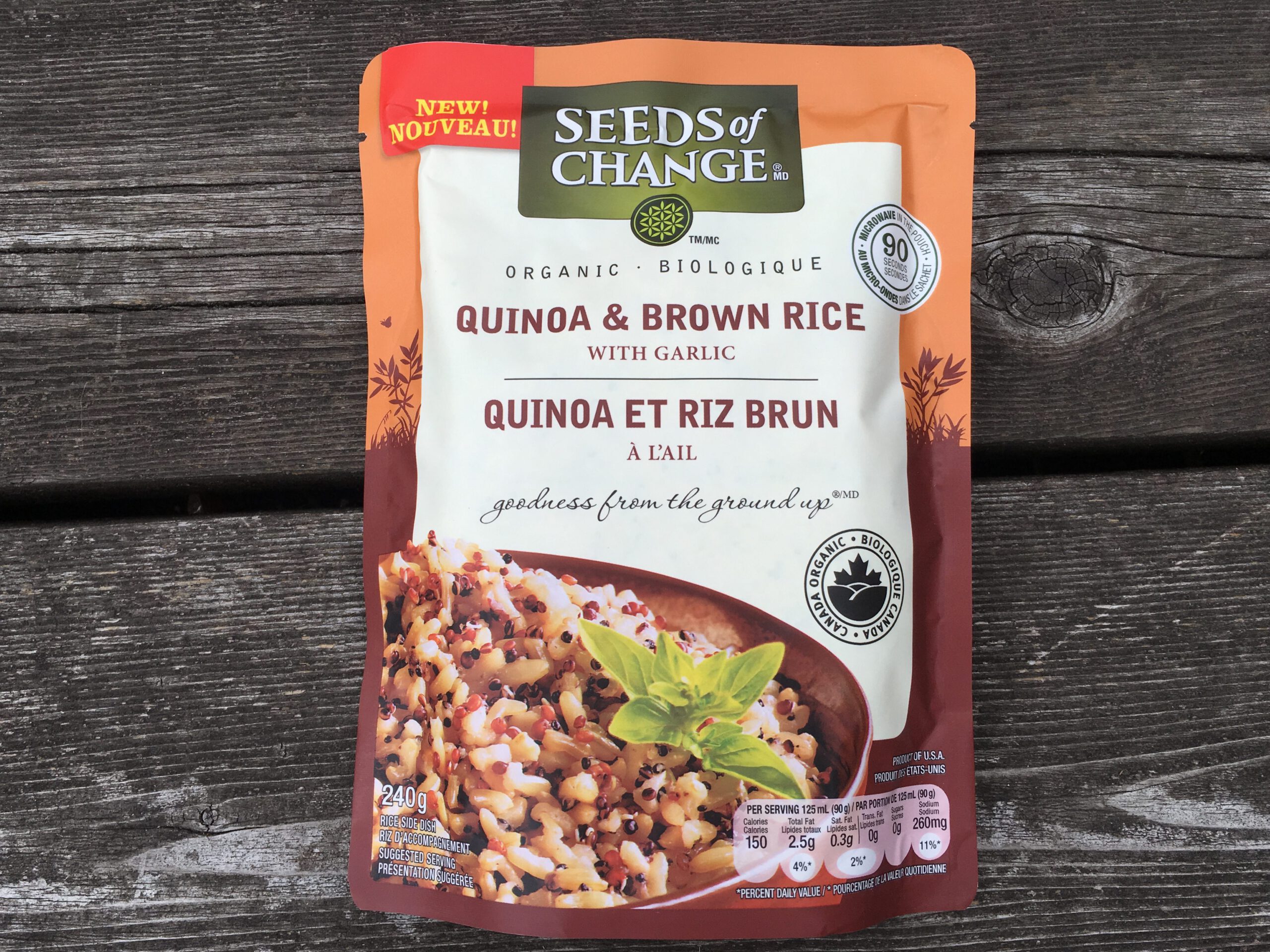 A bag of quinoa and brown rice with herbs.
